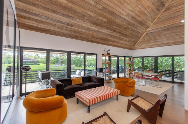 living room with wood finished floors, french doors, high vaulted ceiling, and wooden ceiling