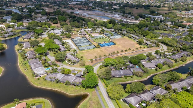 aerial view featuring a residential view and a water view