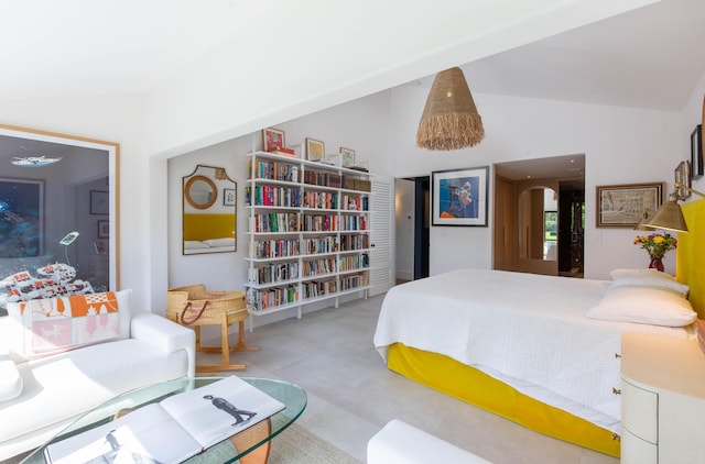 bedroom featuring high vaulted ceiling and arched walkways