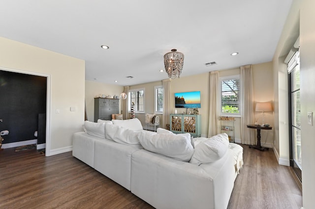 210 Via Villagio, Hypoluxo, FL 33462 - living area with recessed lighting, baseboards, visible vents, and wood finished floors