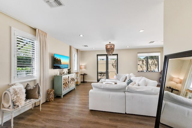 210 Via Villagio, Hypoluxo, FL 33462 - living area with recessed lighting, baseboards, visible vents, and wood finished floors