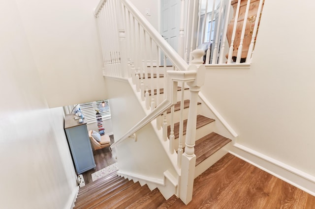 210 Via Villagio, Hypoluxo, FL 33462 - staircase featuring wood finished floors
