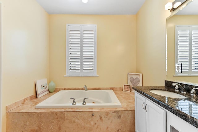 210 Via Villagio, Hypoluxo, FL 33462 - bathroom with a garden tub and vanity
