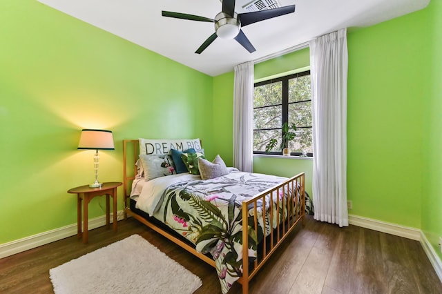 210 Via Villagio, Hypoluxo, FL 33462 - bedroom with a ceiling fan, baseboards, visible vents, and wood finished floors