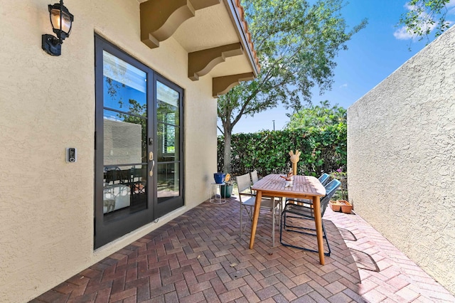 210 Via Villagio, Hypoluxo, FL 33462 - view of patio with outdoor dining area