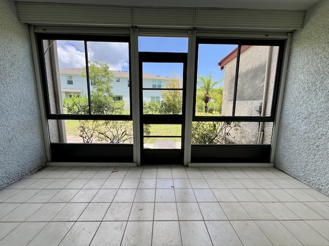4345 Trevi Ct Unit 108, Lake Worth, FL 33467 - unfurnished sunroom with healthy amount of natural light