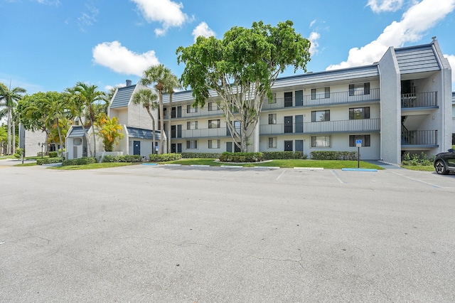 4345 Trevi Ct Unit 108, Lake Worth, FL 33467 - view of apartment building / complex with uncovered parking
