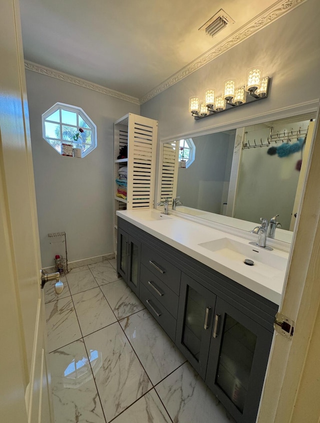 6807 Via Regina Unit 1, Boca Raton, FL 33433 - full bathroom with marble finish floors, healthy amount of natural light, double vanity, and baseboards