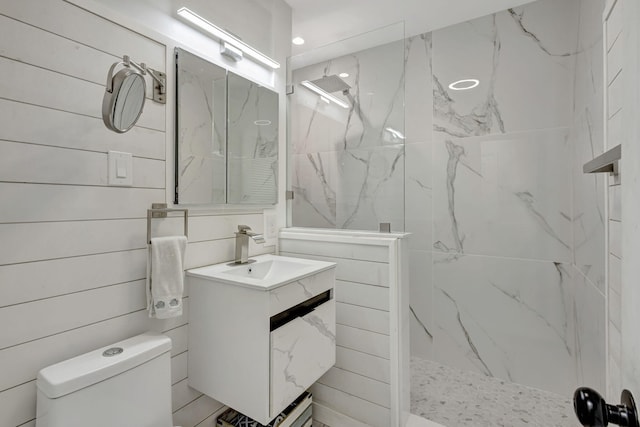 2940 SE Treasure Island Rd, Port Saint Lucie, FL 34952 - bathroom featuring a marble finish shower, vanity, and toilet