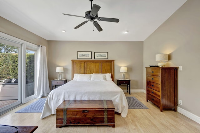 2940 SE Treasure Island Rd, Port Saint Lucie, FL 34952 - bedroom featuring ceiling fan, baseboards, access to outside, and light wood-style floors