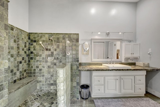 2940 SE Treasure Island Rd, Port Saint Lucie, FL 34952 - bathroom featuring walk in shower and vanity