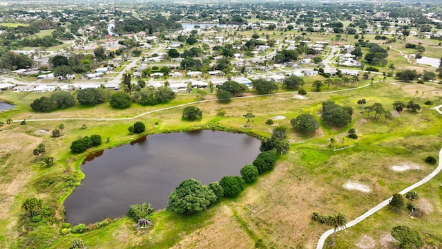2940 SE Treasure Island Rd, Port Saint Lucie, FL 34952 - drone / aerial view featuring a water view