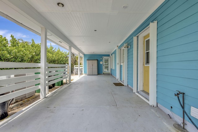 2940 SE Treasure Island Rd, Port Saint Lucie, FL 34952 - view of patio featuring fence
