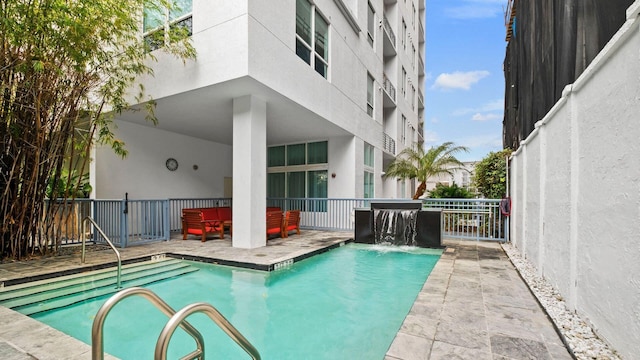 234 NE 3rd St Unit 2206, Miami, FL 33132 - view of pool featuring an outdoor hangout area and a patio area