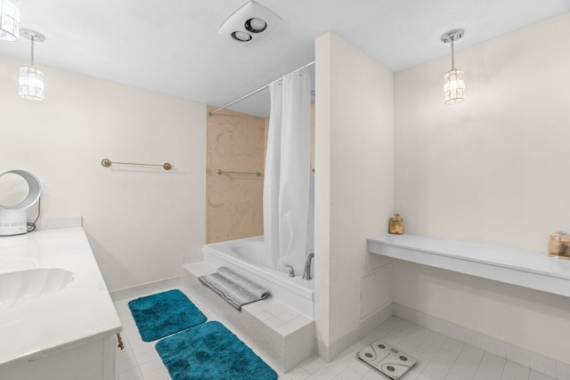 2000 S Ocean Blvd Unit 605, Delray Beach, FL 33483 - bathroom featuring shower / tub combo, vanity, baseboards, and tile patterned floors