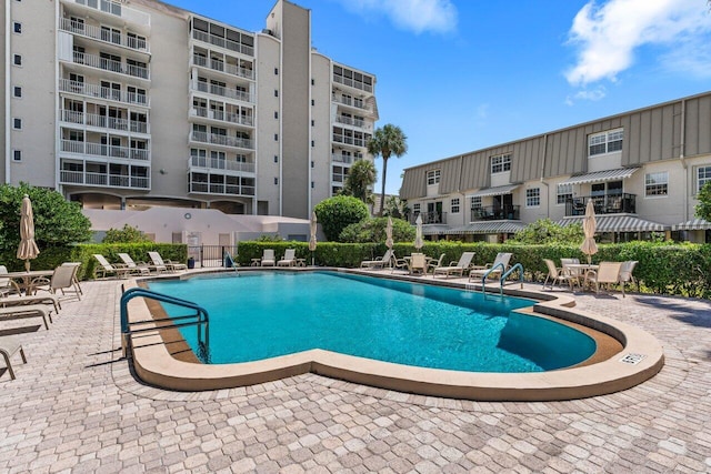 2000 S Ocean Blvd Unit 605, Delray Beach, FL 33483 - community pool featuring a patio area and fence