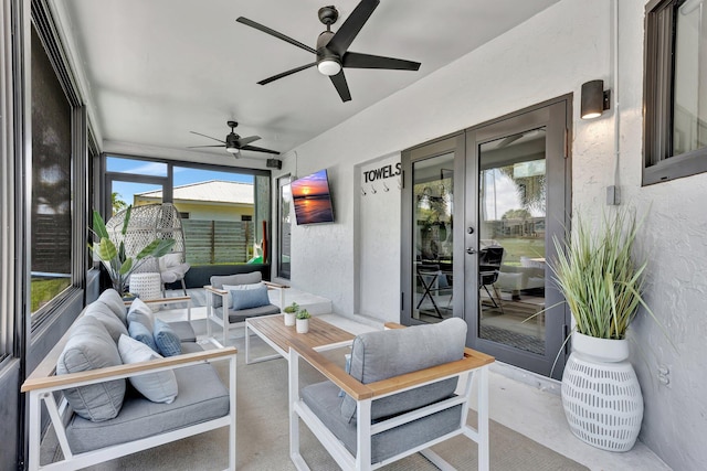 view of patio / terrace featuring french doors, ceiling fan, and outdoor lounge area