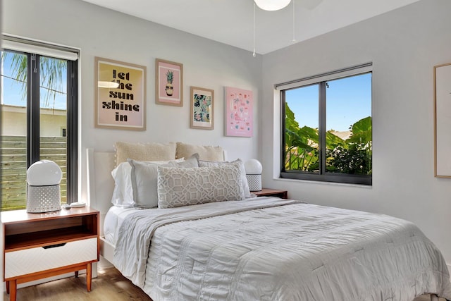 bedroom with wood finished floors