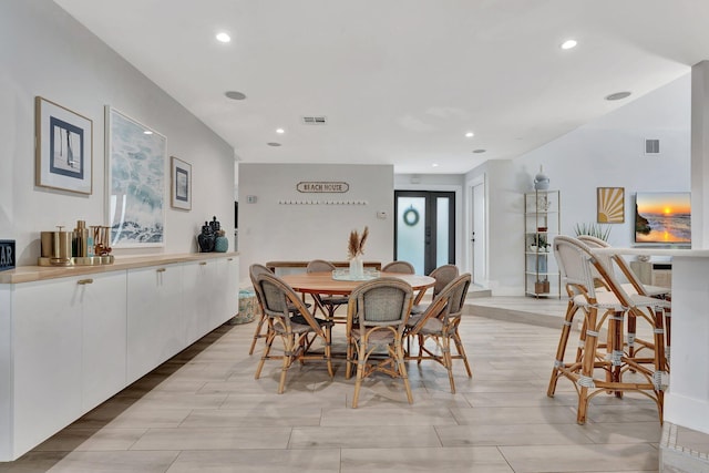 dining area featuring recessed lighting and visible vents