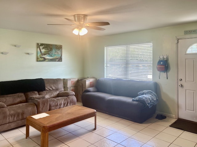 7677 NW 90th Ct, Okeechobee, FL 34972 - living area with light tile patterned flooring and a ceiling fan