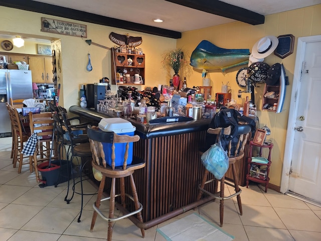 370 SE 14th Ave, Pompano Beach, FL 33060 - indoor bar with tile patterned floors, stainless steel fridge with ice dispenser, and beamed ceiling
