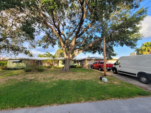 370 SE 14th Ave, Pompano Beach, FL 33060 - view of front of house with a front yard