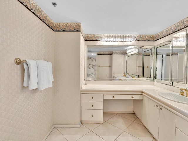 4740 S Ocean Blvd Unit 606, Highland Beach, FL 33487 - bathroom featuring vanity, tile patterned flooring, and wallpapered walls