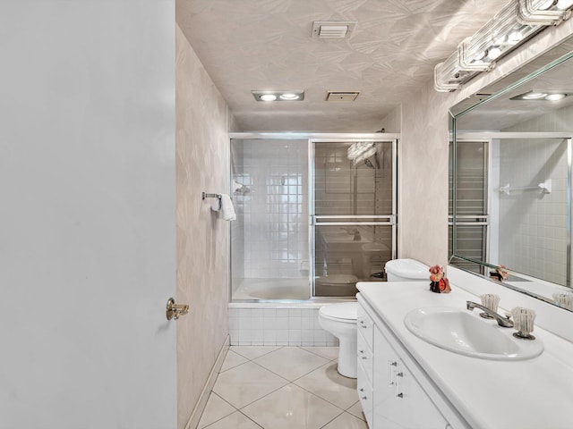 4740 S Ocean Blvd Unit 606, Highland Beach, FL 33487 - full bath featuring vanity, tile patterned floors, tiled shower / bath combo, and toilet
