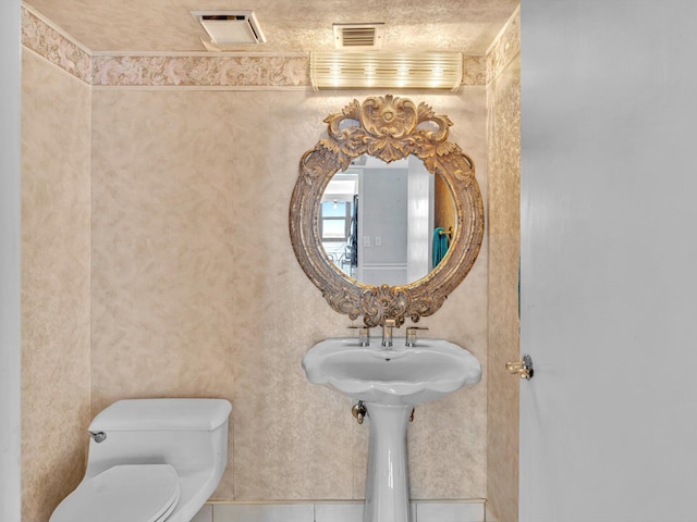 4740 S Ocean Blvd Unit 606, Highland Beach, FL 33487 - bathroom featuring toilet and visible vents