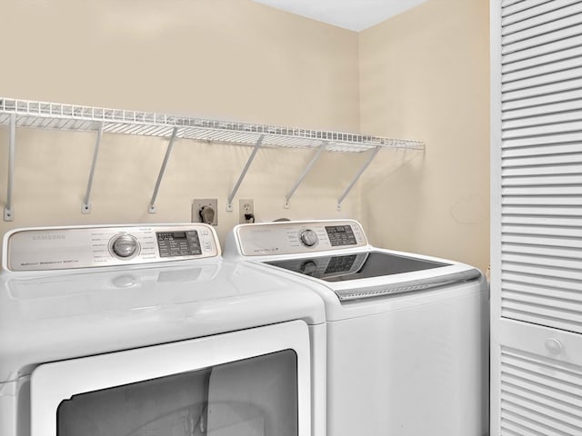 4740 S Ocean Blvd Unit 606, Highland Beach, FL 33487 - washroom featuring laundry area and washing machine and clothes dryer