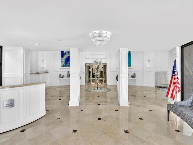 4740 S Ocean Blvd Unit 606, Highland Beach, FL 33487 - interior space featuring recessed lighting, a chandelier, and a decorative wall