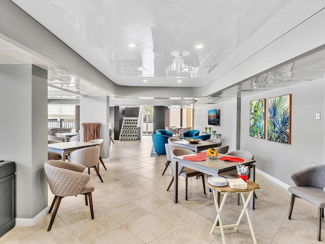 4740 S Ocean Blvd Unit 606, Highland Beach, FL 33487 - dining space featuring light tile patterned floors, baseboards, and recessed lighting