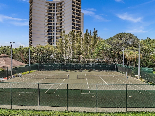 4740 S Ocean Blvd Unit 606, Highland Beach, FL 33487 - view of tennis court with fence