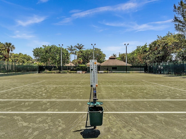4740 S Ocean Blvd Unit 606, Highland Beach, FL 33487 - view of tennis court with fence and community basketball court