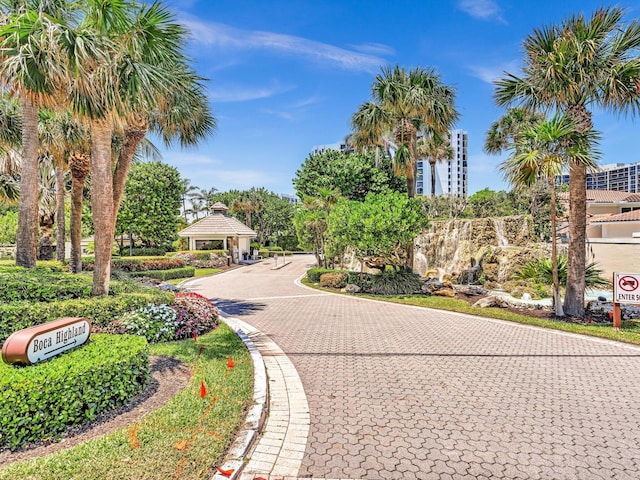 4740 S Ocean Blvd Unit 606, Highland Beach, FL 33487 - view of home's community featuring a gazebo and curved driveway