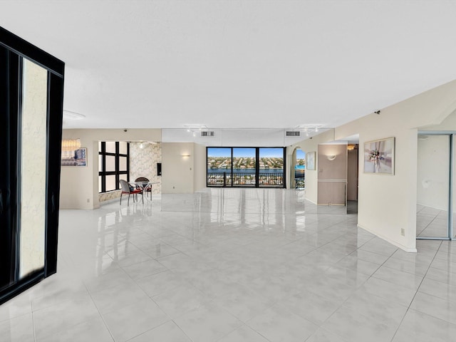 4740 S Ocean Blvd Unit 606, Highland Beach, FL 33487 - unfurnished room with light tile patterned flooring and visible vents