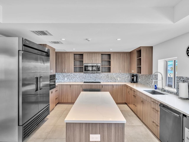 4740 S Ocean Blvd Unit 606, Highland Beach, FL 33487 - kitchen with visible vents, open shelves, a sink, and black appliances