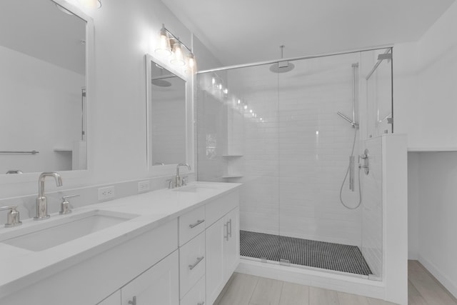 324 Bayfront Dr, Boynton Beach, FL 33435 - full bathroom featuring double vanity, a stall shower, and a sink