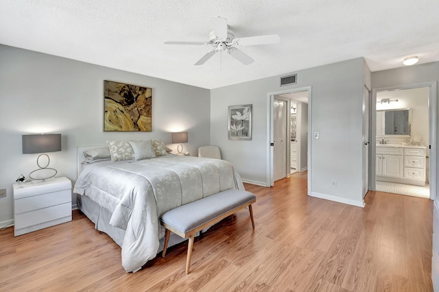 14699 Canalview C Dr Unit C, Delray Beach, FL 33484 - bedroom with light wood-type flooring, baseboards, a sink, and ceiling fan