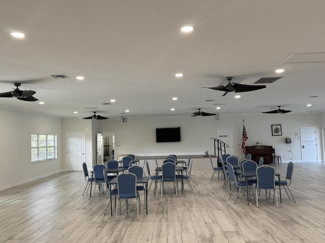14699 Canalview C Dr Unit C, Delray Beach, FL 33484 - dining space featuring a ceiling fan, crown molding, recessed lighting, light wood-style floors, and baseboards