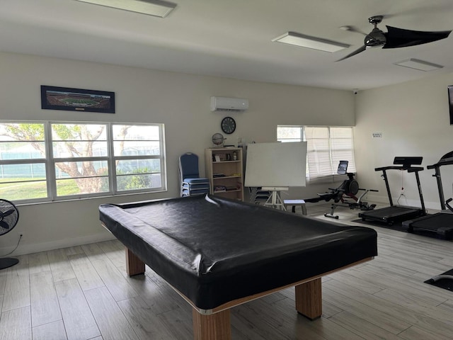 14699 Canalview C Dr Unit C, Delray Beach, FL 33484 - rec room featuring an AC wall unit, a ceiling fan, pool table, baseboards, and wood finished floors