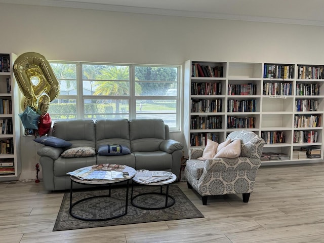 14699 Canalview C Dr Unit C, Delray Beach, FL 33484 - living room featuring ornamental molding, wood finished floors, and healthy amount of natural light