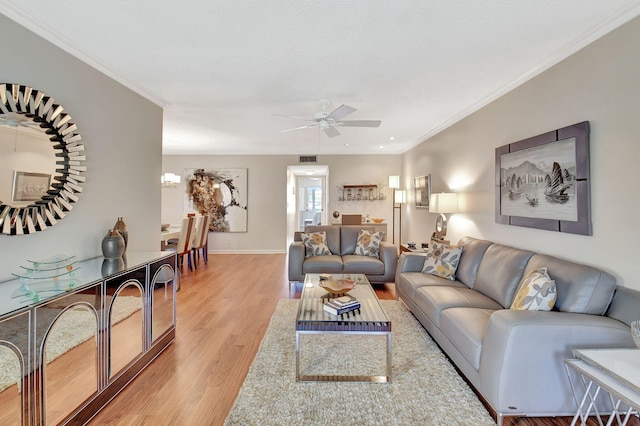 14699 Canalview C Dr Unit C, Delray Beach, FL 33484 - living area with light wood-style floors, a ceiling fan, ornamental molding, and baseboards
