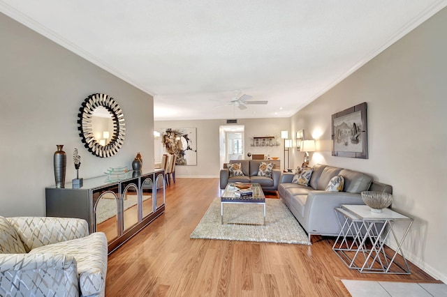 14699 Canalview C Dr Unit C, Delray Beach, FL 33484 - living area featuring light wood-style floors, a ceiling fan, baseboards, and ornamental molding