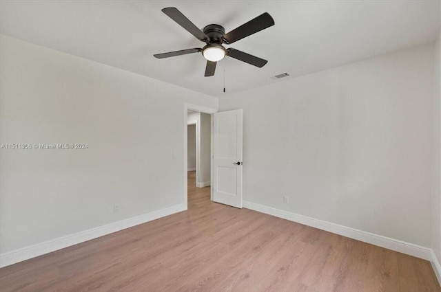 15763 Alexander Run, Jupiter, FL 33478 - unfurnished room featuring light wood-style flooring, ceiling fan, and baseboards