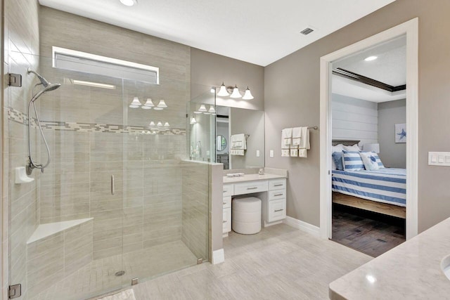 420 SE Bancroft Ct, Port Saint Lucie, FL 34984 - full bath featuring vanity, ensuite bath, a stall shower, baseboards, and recessed lighting