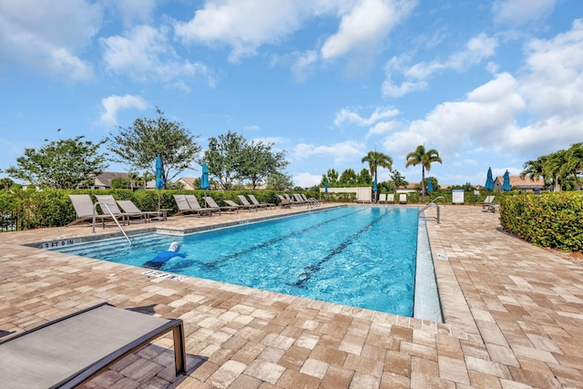 pool with a patio