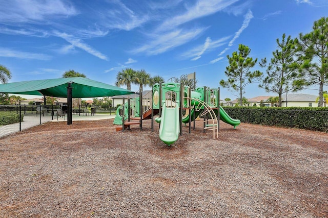 community jungle gym with fence
