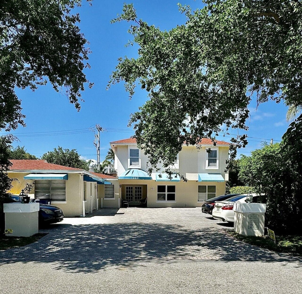 1200 Surf Rd, Singer Island, FL 33404 - exterior space with aphalt driveway