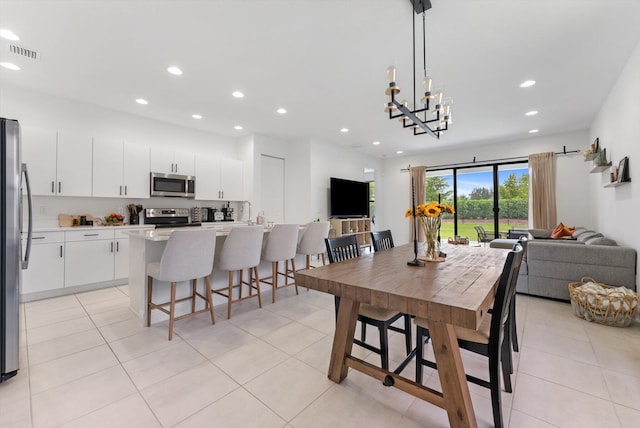 16390 Sea Turtle Pl, The Acreage, FL 33470 - dining space with recessed lighting, an inviting chandelier, visible vents, and light tile patterned floors